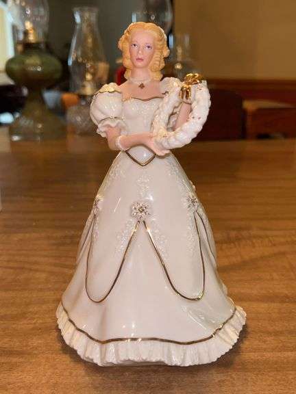 Lenox 1999 Limited Edition “A Christmas Welcome” Ivory Classic Figurine…..8-1/2” tall image