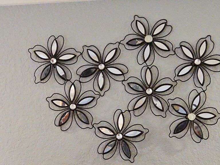 Mirrored wall hanging. Approximately 32 in wide.