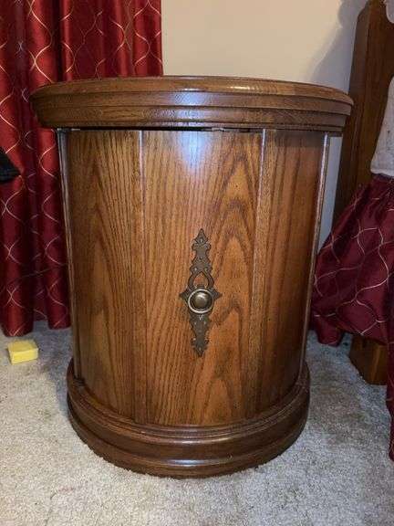 MCM drum-style nightstand with intricately carved top, glass overlay and bottom storage….18”D x 20” tall image