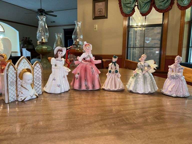 Great looking selection of porcelain Victorian ladies and Virgin Mary pocket planter……sizes range from 6 to 8-1/4” tall image