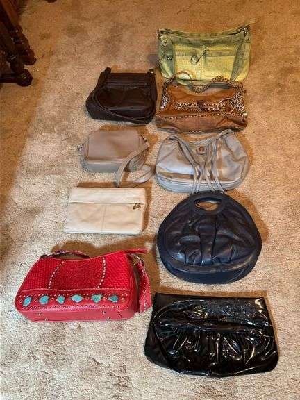 Grouping of ladies handbags in various materials, design and sizes image
