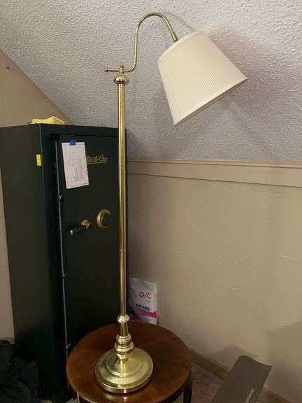 Gold tone single arm floor lamp…..55-1/2” tall and in working condition image