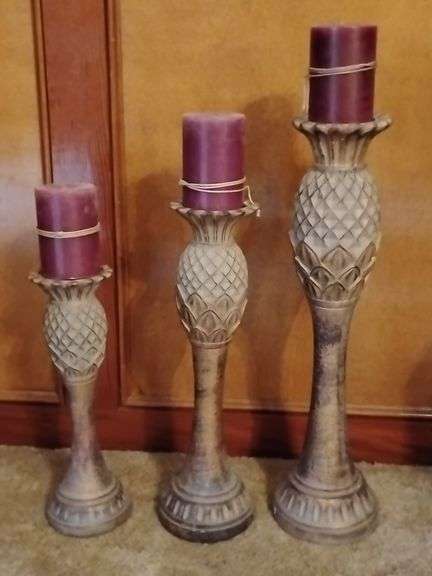 Grouping of 3 various size decorative candle sticks....22, 18, 14" image