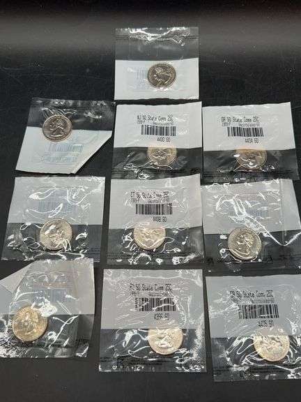 Grouping of (10) uncirculated-60 1999 P&D statehood quarters from Littleton Coin Co. in original packaging image
