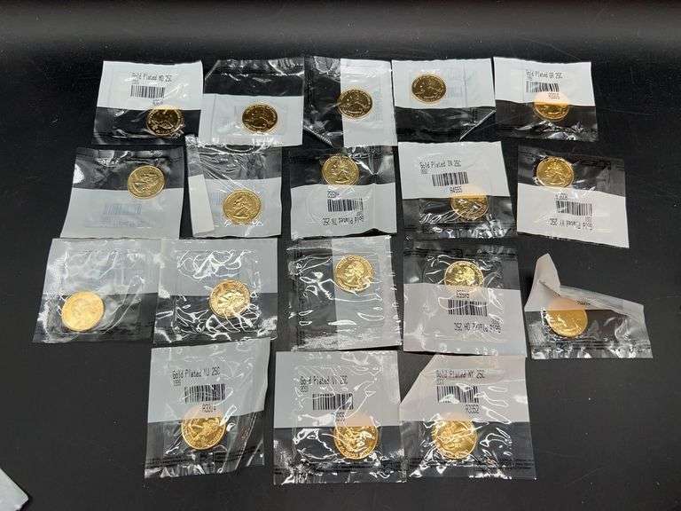 Grouping of 18 uncirculated gold plated state quarters in original packaging from Littleton Coin Company image