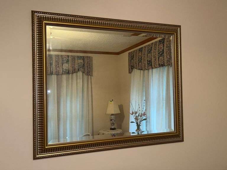 Beveled glass mirror with gold gilt frame…..35 x 29 image