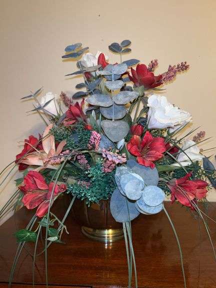 Footed brass planter with nice artificial florals image