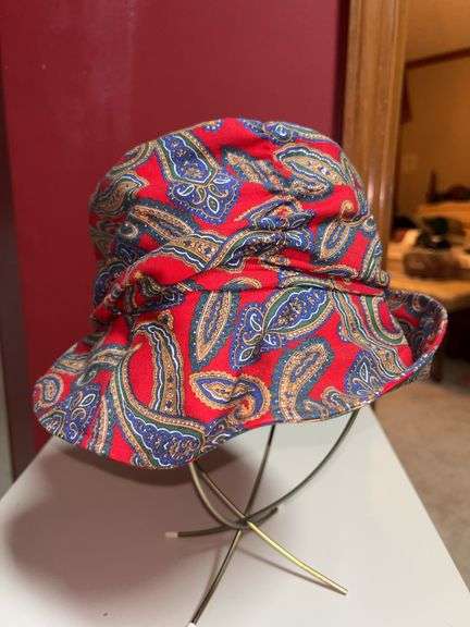 Headliner brand bucket-style hat with hat pin on one side image