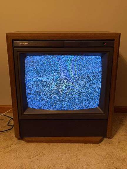 Vintage (1991) Quasar Console TV on swivel base with remote in working condition…..28-1/2 x 16-1/2 x 31 tall image
