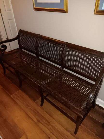 Vintage Cane back and bottom bench..very cute. Has 2 small damaged spots on back as shown in photos. 60x31x22
