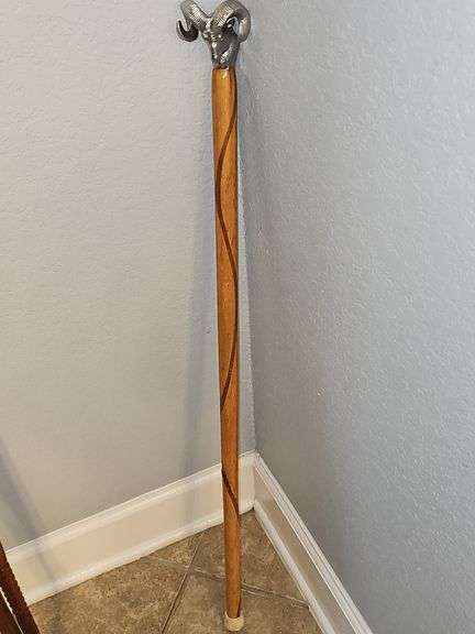 38-in tall Rams head cane. Has been repaired. Ram's head is removable if you desire to put it on another cane.