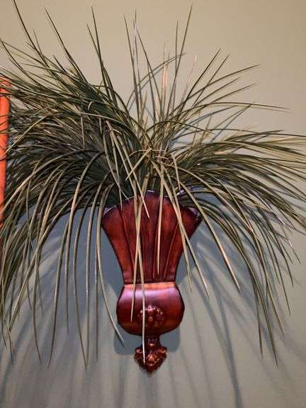Beautiful decorative metal wall sconce with plastic greenery…..12” tall image