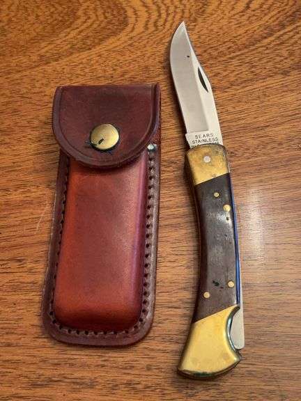Vintage Sears 4-15/16” Lockback Knife with leather sheath and original box (95416)….box has blemish image