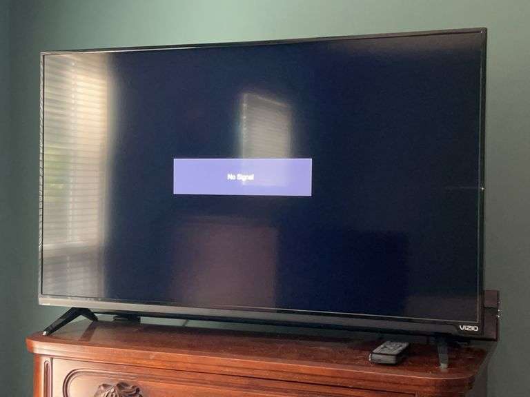 Vizio￼ 43” smart TV with remote and Panasonic (SC-HTB79) sound bar without remote (see all pics)…..both power up image