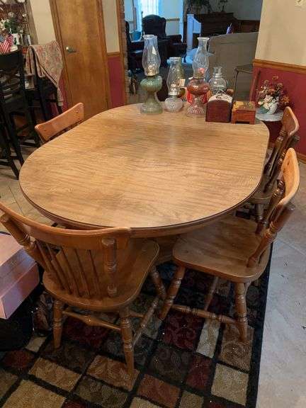 Great looking maple(?) kitchen table and 6 chairs by Flander…..table measures 62-1/2 x 44 x 29 tall…..chairs are 17-1/2 x 15 x 32-1/2 tall…..shows wear from normal use image