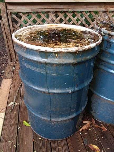 Empty blue metal barrel 35 x 24.