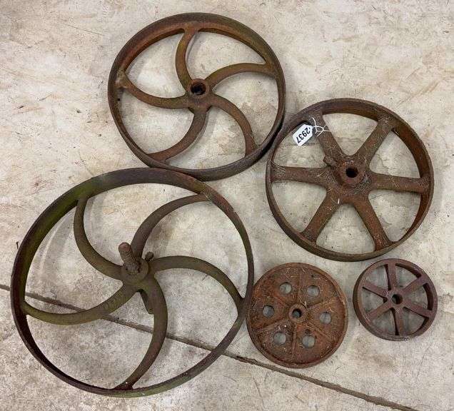 Five various sized flywheels image