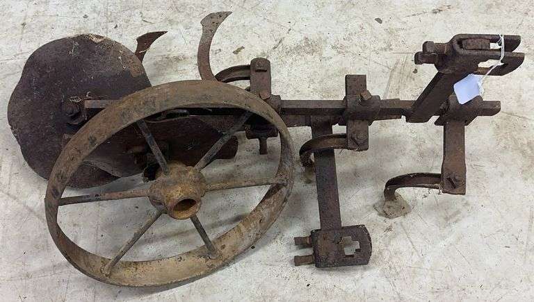 Antique Cultivator & Cast Iron Wheel image