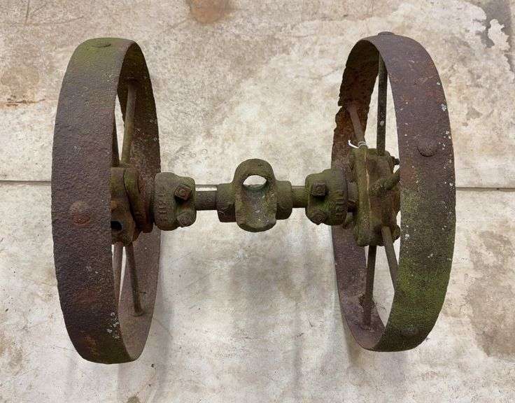 Pair of 16” steel wheels on shaft image