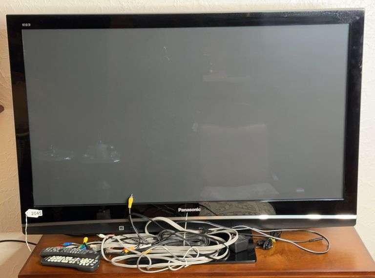 Panasonic Flat Screen TV With Remotes & Cords image