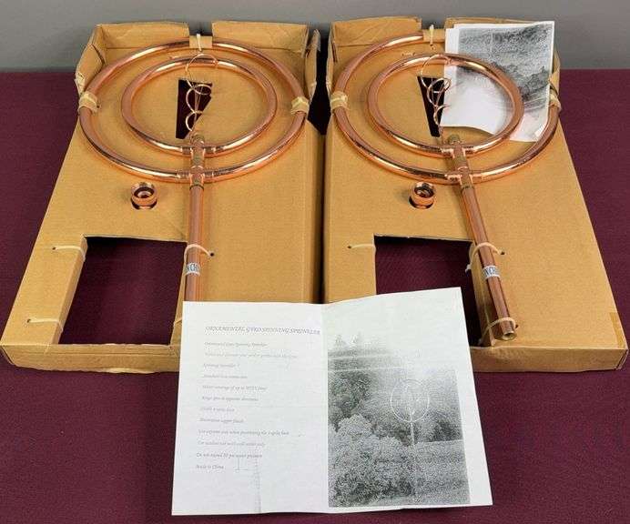 Pair of Copper Ornamental Gyro Spinning Sprinker image