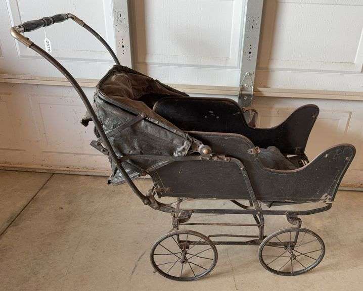 Antique Rolling Baby Carriage image