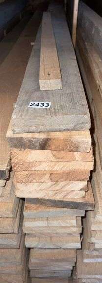 Stack of (30) Hard Wood, Rough Cut, Red Oak Boards image
