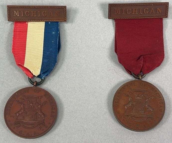 Pair of Michigan G.A.R. 1890 Encampment Badges image