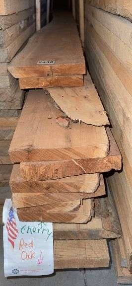 Stack of (15) Hard Wood, Rough Cut, Red Oak & Cherry Boards image