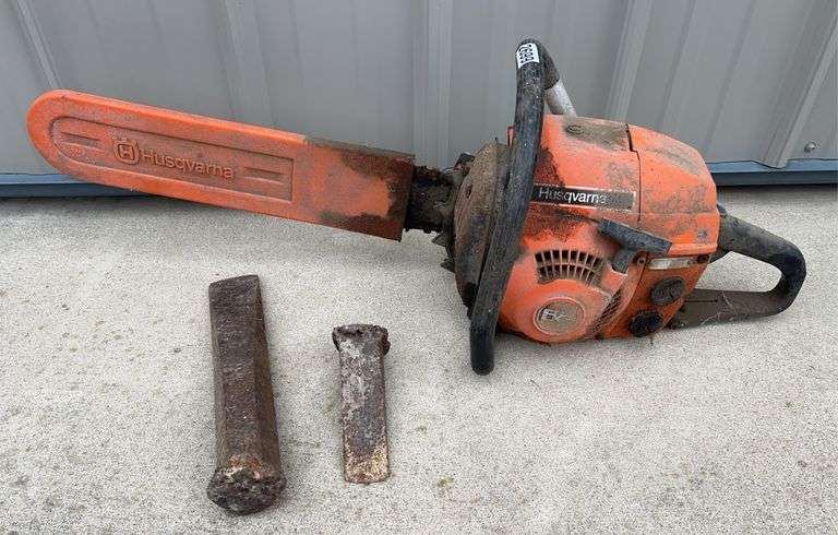 Husqvarna Chain Saw & Pair Of Steal Splitting Wedges image