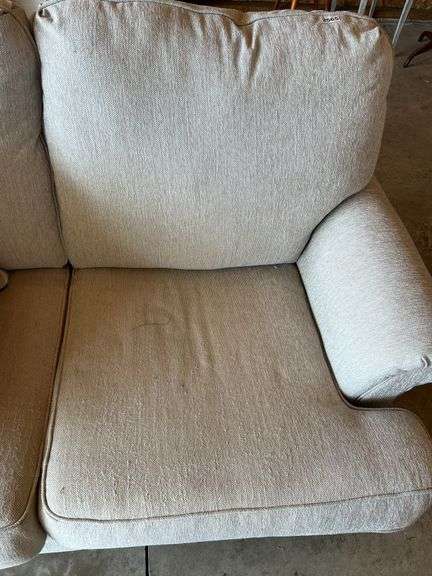 Upholstered Tan Loveseat