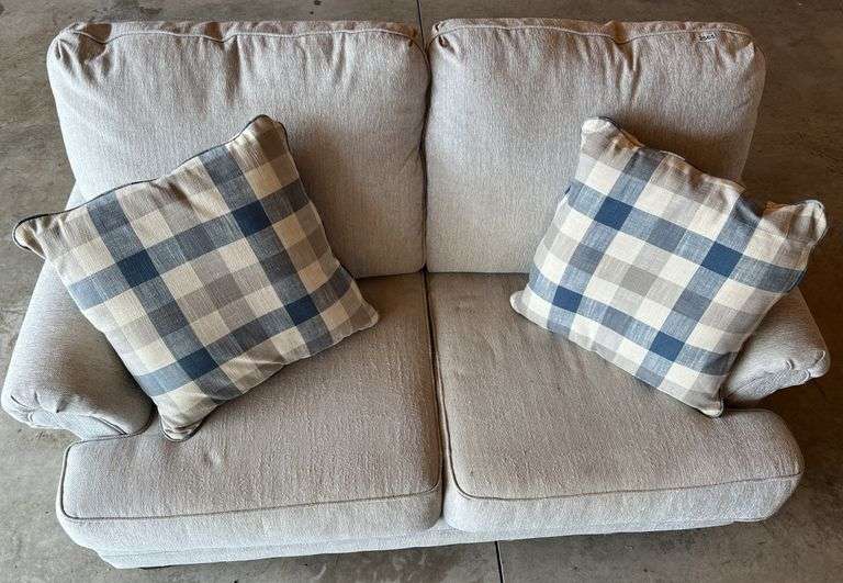 Upholstered Tan Loveseat