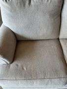 Upholstered Tan Loveseat
