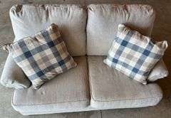Upholstered Tan Loveseat