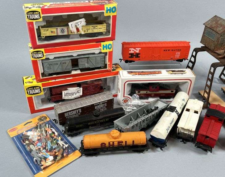 Trains, Cars, Crane, and People