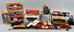Trains, Cars, Crane, and People