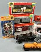 Trains, Cars, Crane, and People