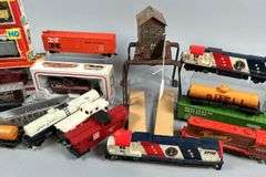 Trains, Cars, Crane, and People