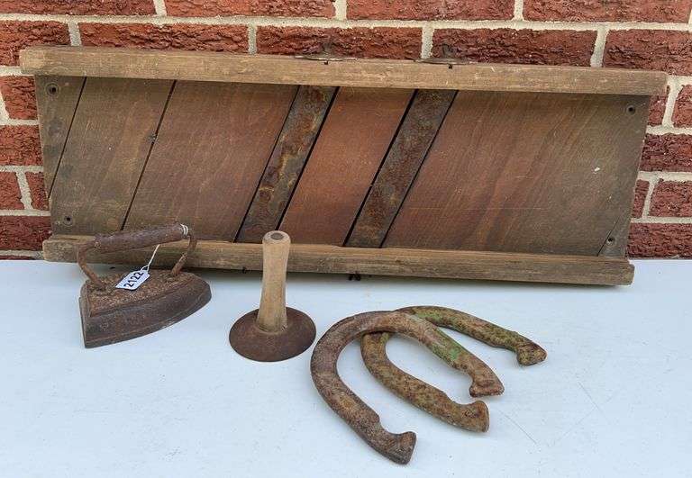 Sad Iron, Horseshoes, Slaw Cutter, and Hog Scraper image