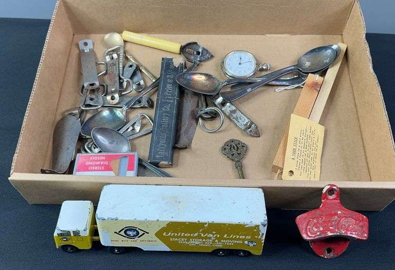 Bottle Openers, a Metal Toy Truck, and Other Trinkets image
