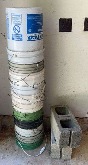 Stack of 5 Gallon Buckets & 2 Cinder Blocks image