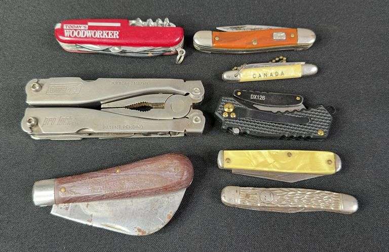 Multitool and 7 Pocket Knives image