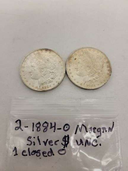 2 1884-O Morgan silver dollars Unc image