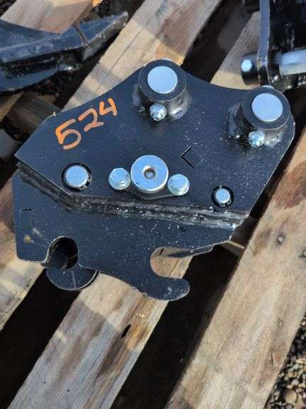 Mini excavator quick attach changer image