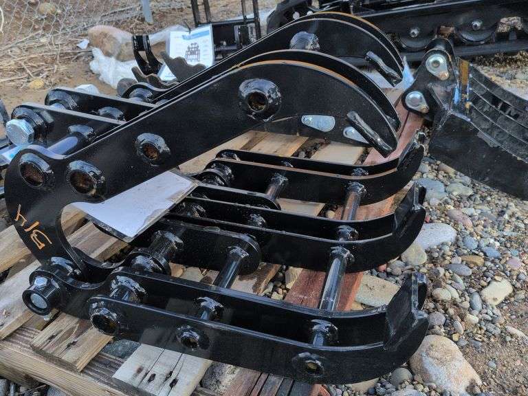 Mini excavator wood grabber image