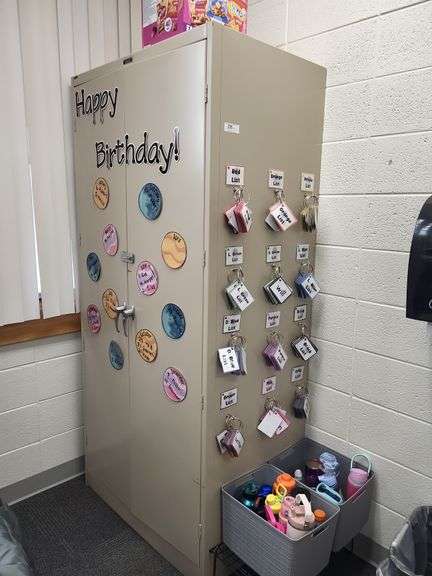 Lg storage cabinet items on and around cabinet not included image