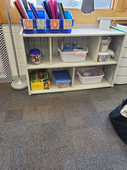 White storage shelf- contents on and around shelf not included image