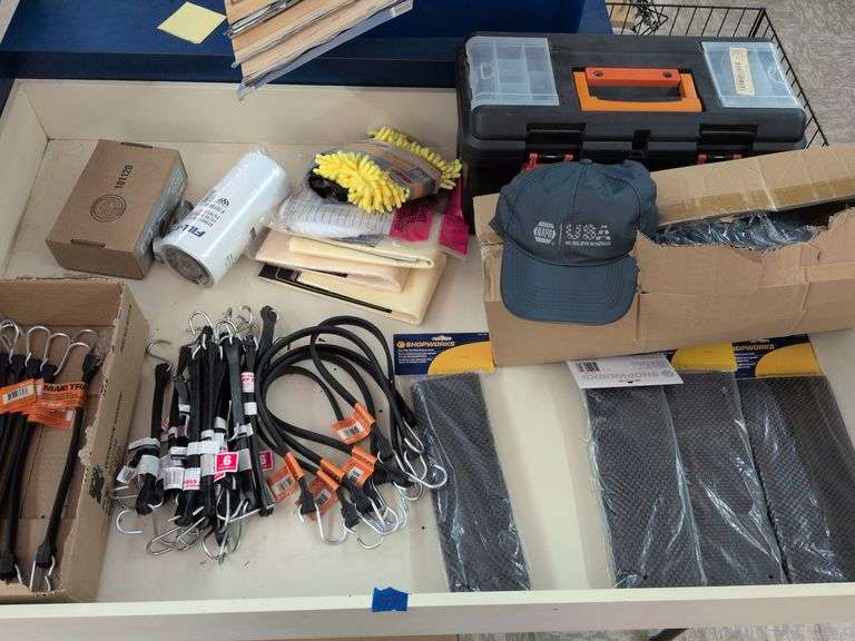 Misc lot tool box, bungee, shammy, filters, napa hats image
