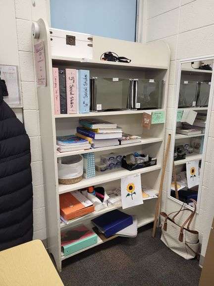 White bookshelf- contents on and around not included image