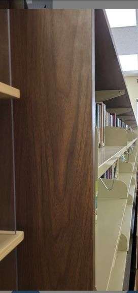 24ft library wall shelf- books on and around not included, disassembly required image